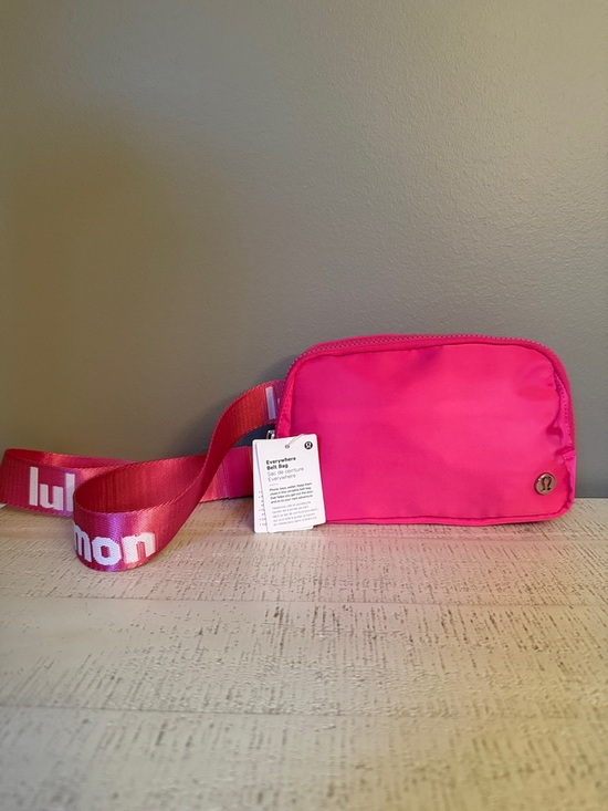 Lululemon Handbags - lululemon athletica Pink Crossbody Bag with Branded Strap
